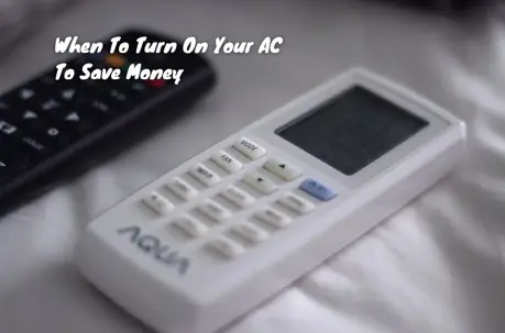 Two remote controls on a bed